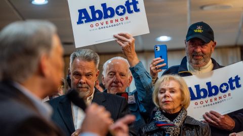 Supporters listen to Texas Gov. Greg Abbott speak during the "Get Out The Vote" campaign event on February 23, 2022 in Houston, Texas.