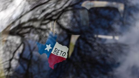 A cutout in the shape of Texas, with O'Rourke's name written on it, hangs from the rearview mirror in his truck on February 19, 2022, in Brownsville, Texas.