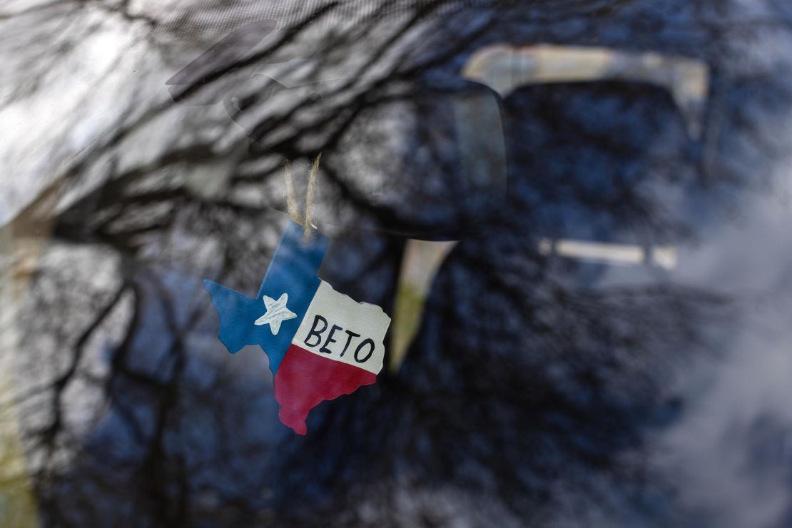 A cutout in the shape of Texas, with O'Rourke's name written on it, hangs from the rearview mirror in his truck on February 19, 2022, in Brownsville, Texas.
