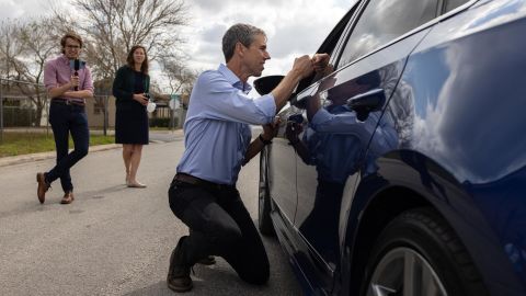 O'Rourke speaks to a motorist while canvassing a neighborhood in Brownsville, Texas, on February 19, 2022.
