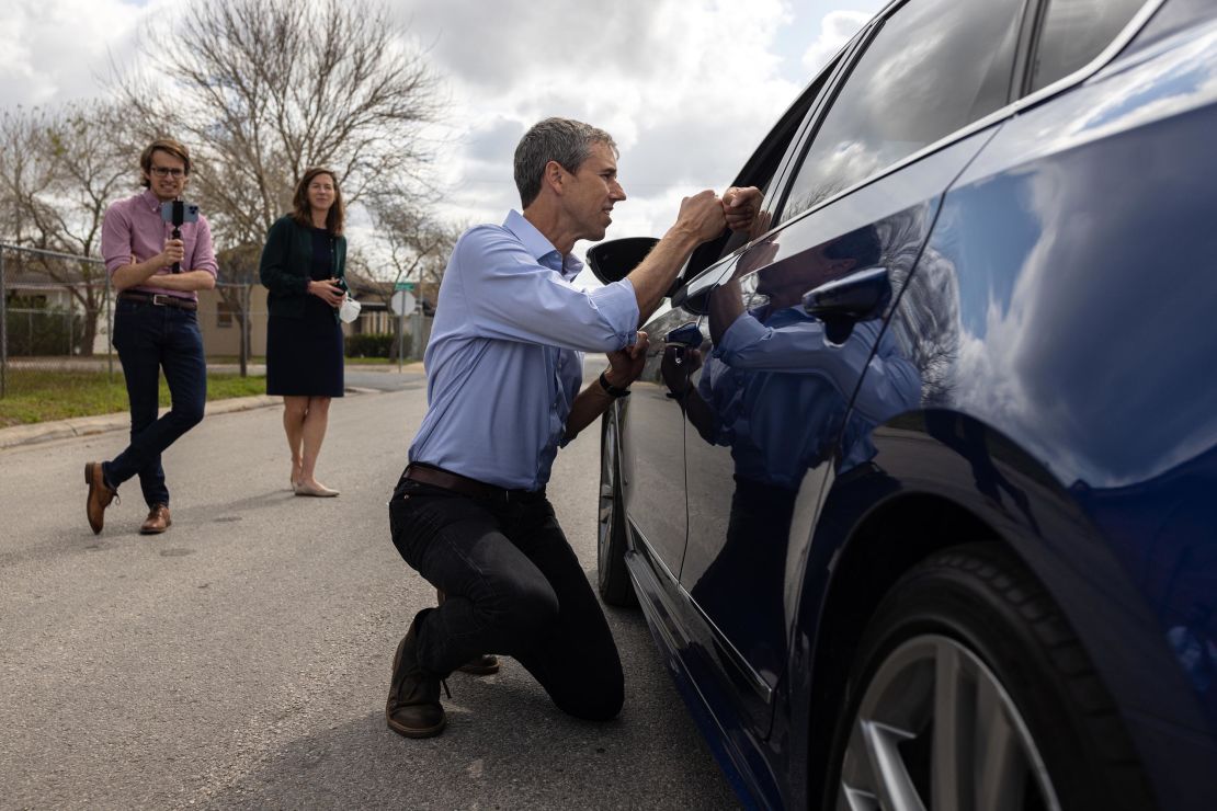 O'Rourke speaks to a motorist while canvassing a neighborhood in Brownsville, Texas, on February 19, 2022.