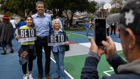 Beto O'Rourke, Texas Democratic candidate for governor, takes photos with supporters during a blockwalk kick-off event at Garfield Park in Brownsville, Texas, on February 19, 2022.