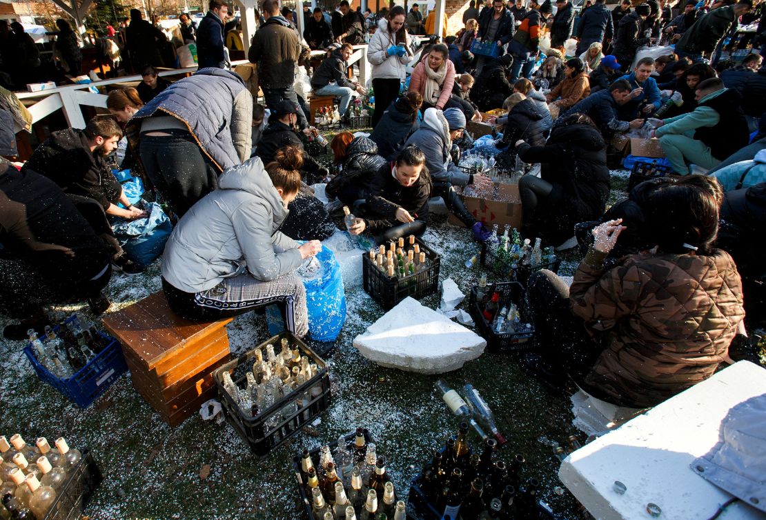 Residents in Uzhhorod prepare Molotov cocktails after Russia launched a massive military operation against Ukraine.