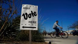 Voters leave an early voting poll site February 14, 2022, in San Antonio. 