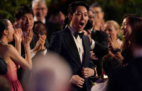 "Squid Game" star Lee Jung-jae reacts after it was announced that he had won a Screen Actors Guild award on Sunday, February 27. He and his co-star Jung Ho-yeon each won an award for outstanding performance in a drama series.