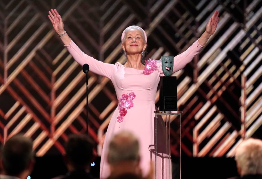 Actress <a href="http://www.cnn.com/2022/02/25/entertainment/gallery/helen-mirren/index.html" target="_blank">Helen Mirren</a> accepts her lifetime achievement award during the show.