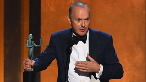 Actor Michael Keaton accepts the award for outstanding performance by a male actor in a television movie or limited series onstage during the 28th Annual Screen Actors Guild (SAG) Awards at the Barker Hangar in Santa Monica, California, on February 27, 2022. 