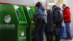 MOSCOW, RUSSIA - FEBRUARY 27, 2022: People use Sberbank ATM machines at the Kazansky railway station. Artyom Geodakyan/TASS (Photo by Artyom Geodakyan\TASS via Getty Images)