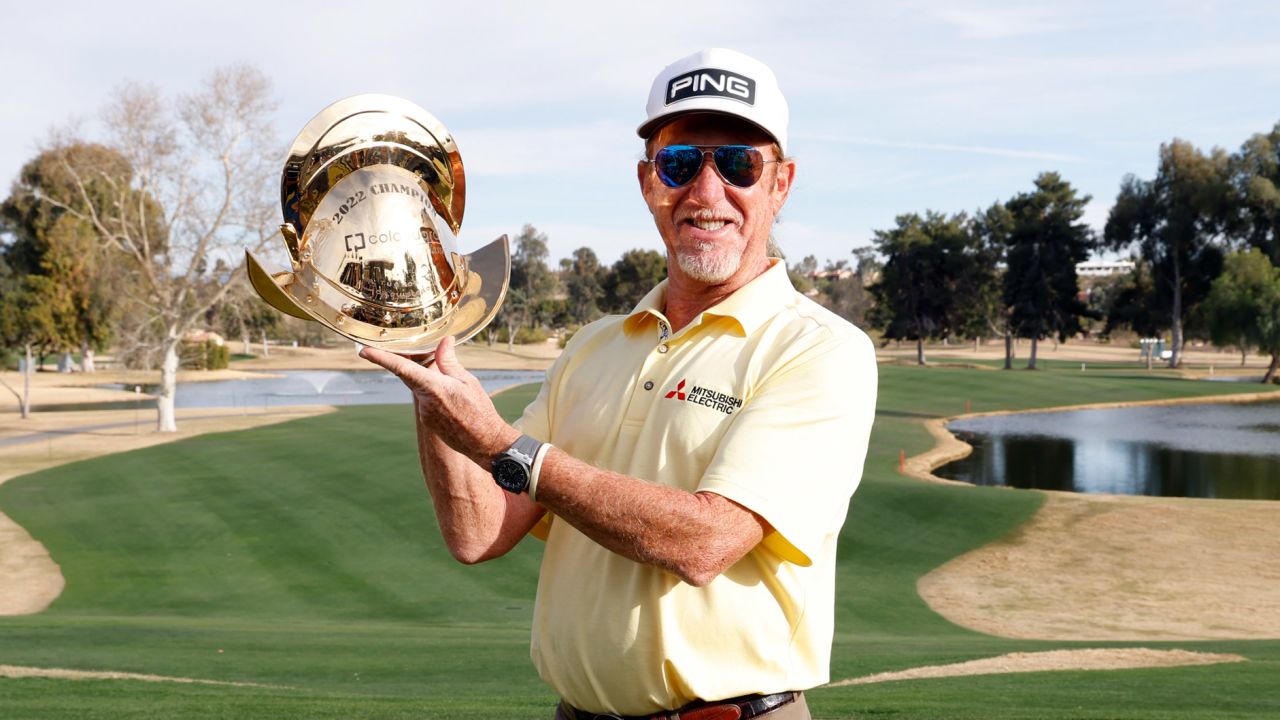 Jimenez poses with the Champion's trophy following the final round of the Cologuard Classic.