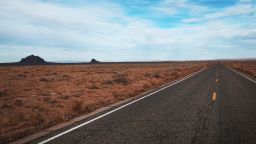 Empty roadway sits along a main road on December 16, 2021 in Two Grey Hills, New Mexico. The Covid-19 pandemic has restricted many activities and events in Native American communities throughout Arizona and New Mexico. 