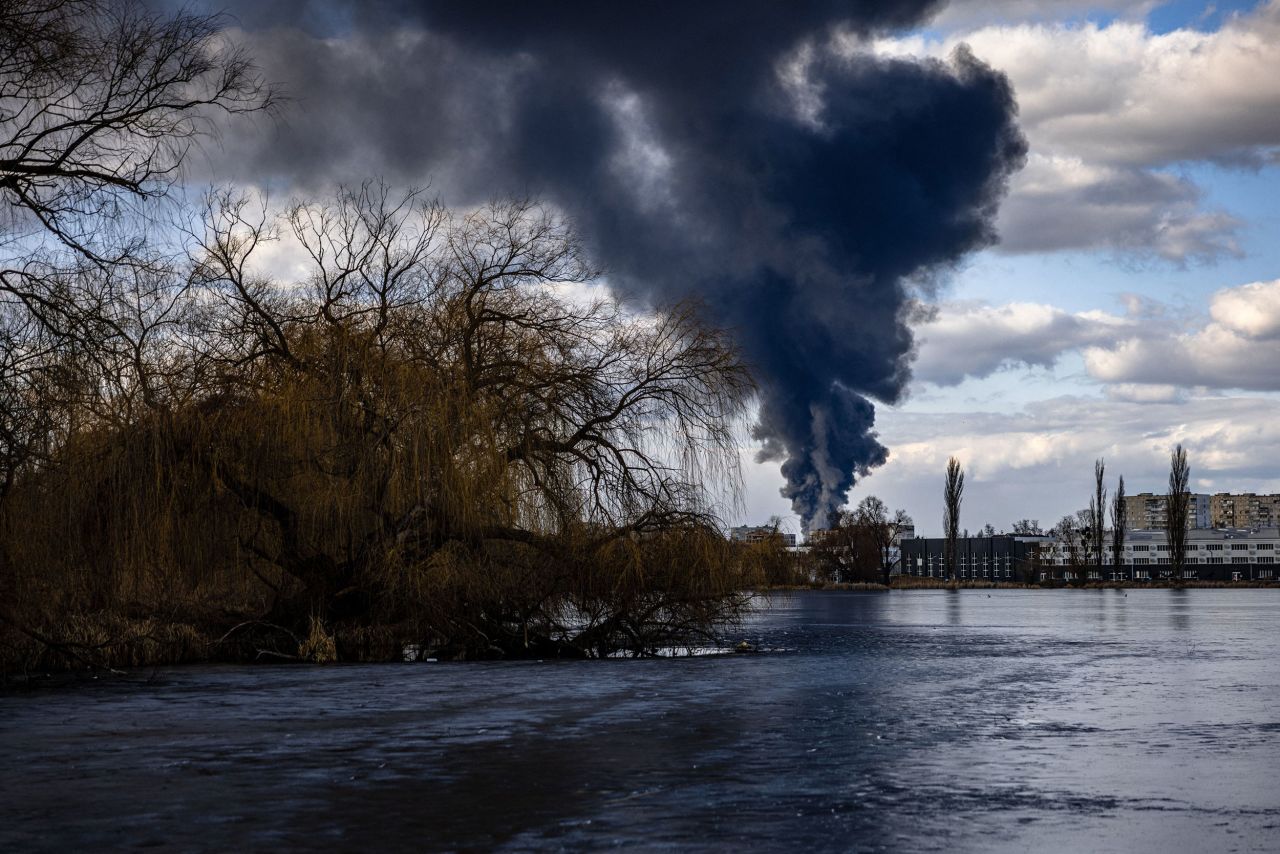 Smoke billows over the Ukrainian city of Vasylkiv, just outside Kyiv on February 27. A fire at an oil storage area was seen raging at the Vasylkiv Air Base.