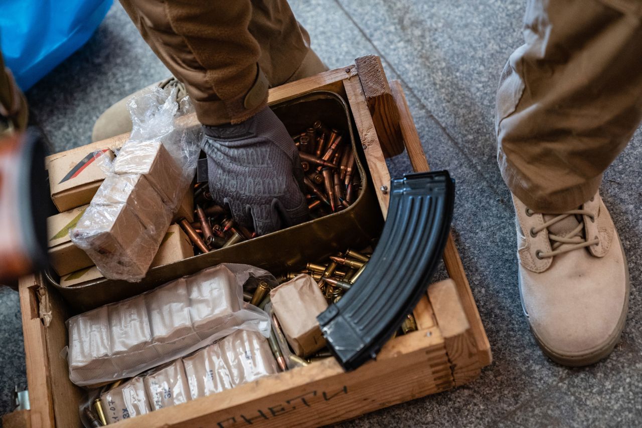 A member of the Territorial Defense Forces loads rifle magazines in Kyiv on February 28.  Zelensky says Russia waging war so Putin can stay in power &#8216;until the end of his life&#8217; w 1280