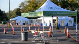 Tents used for COVID-19 testing are viewed in the parking lot of a Quest Diagnostics facility during a new coronavirus pandemic, Friday, Feb. 11, 2022, in Tampa, Fla. (Phelan M. Ebenhack via AP)