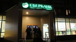 People line up at the ATM of Sberbank, which is included on the sanctions list by EU and U.S. on February 28, 2022 in Moscow, Russia. 