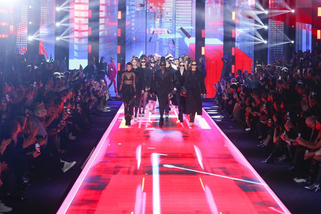 Dolce & Gabbana used a vibrant backdrop of a virtual cityscape.