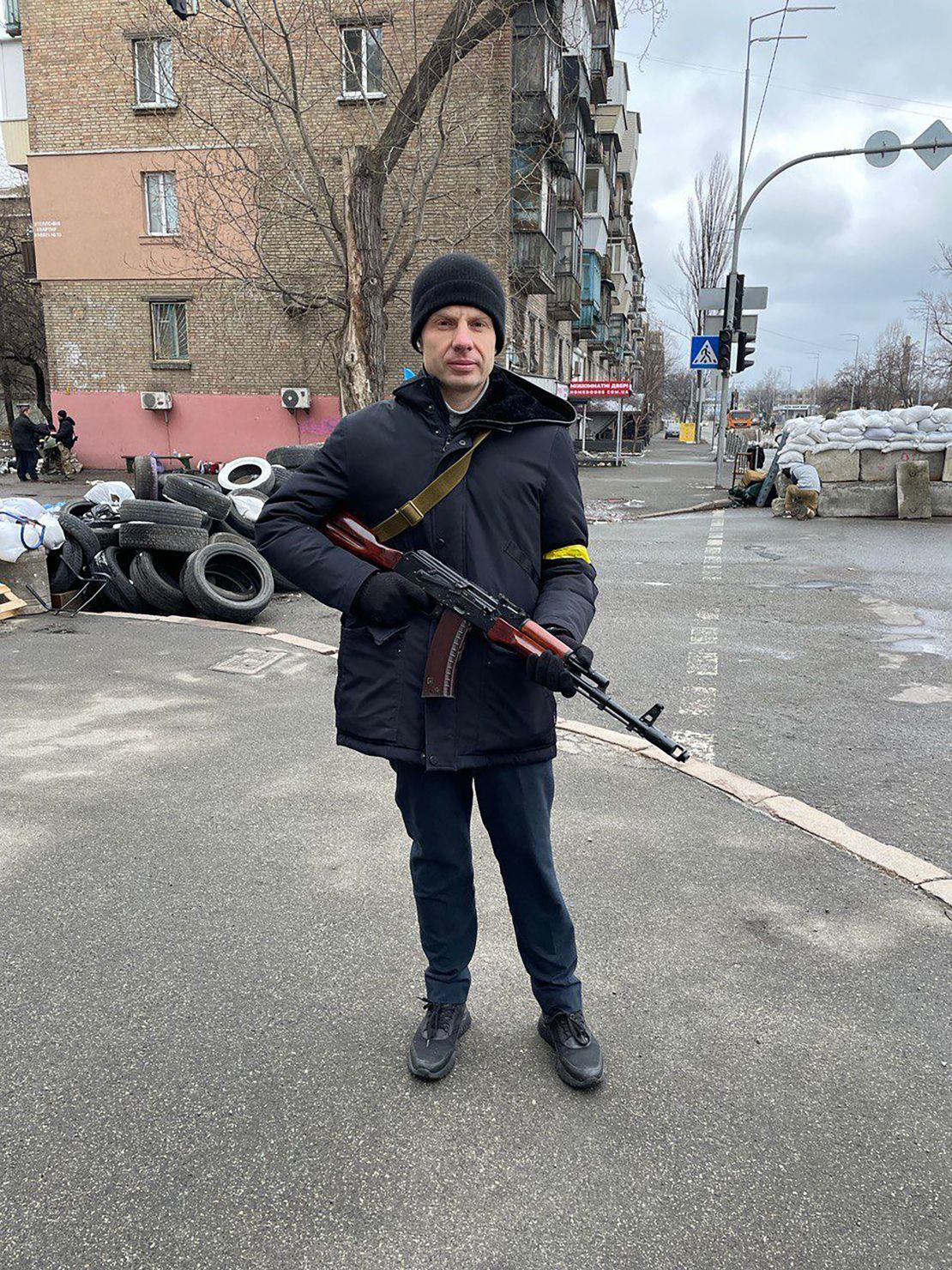 Oleksiy Goncharenko -- a member of Ukraine's parliament -- mans a checkpoint in Kyiv on Tuesday, March 1.