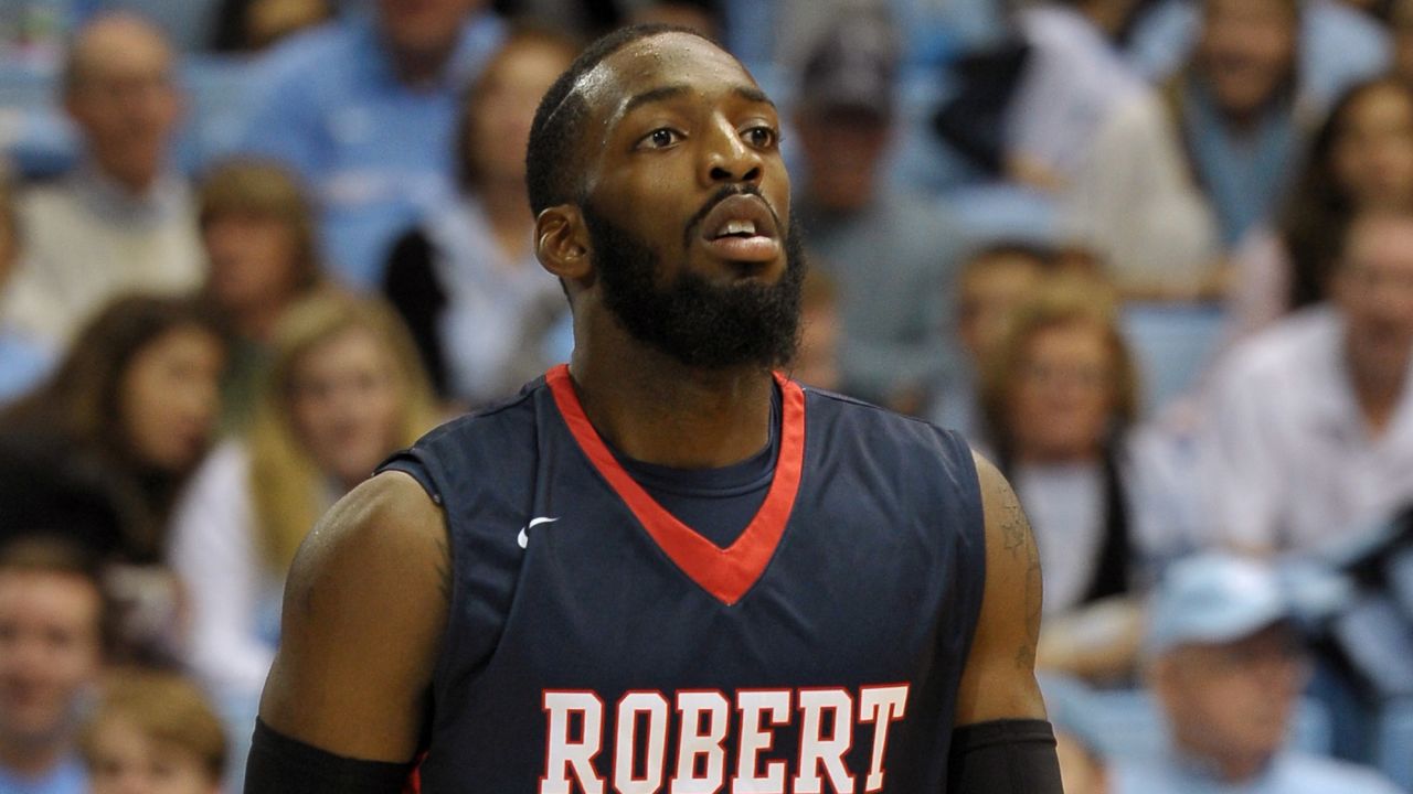A 2014 photo shows Lucky Jones during a basketball game when he played for Robert Morris University.