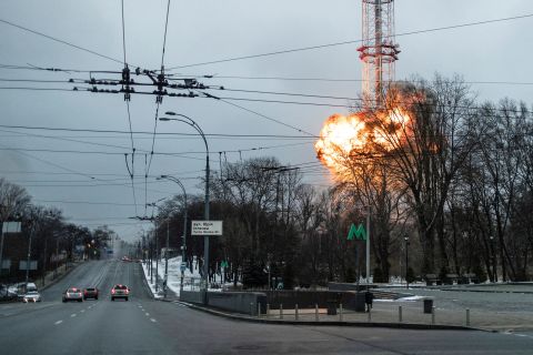 An explosion is seen at a TV tower in Kyiv on March 1. Russian forces fired rockets near the tower and struck a Holocaust memorial site in Kyiv hours after warning of 