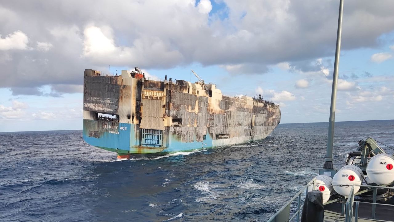 Burnt-out cargo ship carrying thousands of luxury cars sinks | CNN 