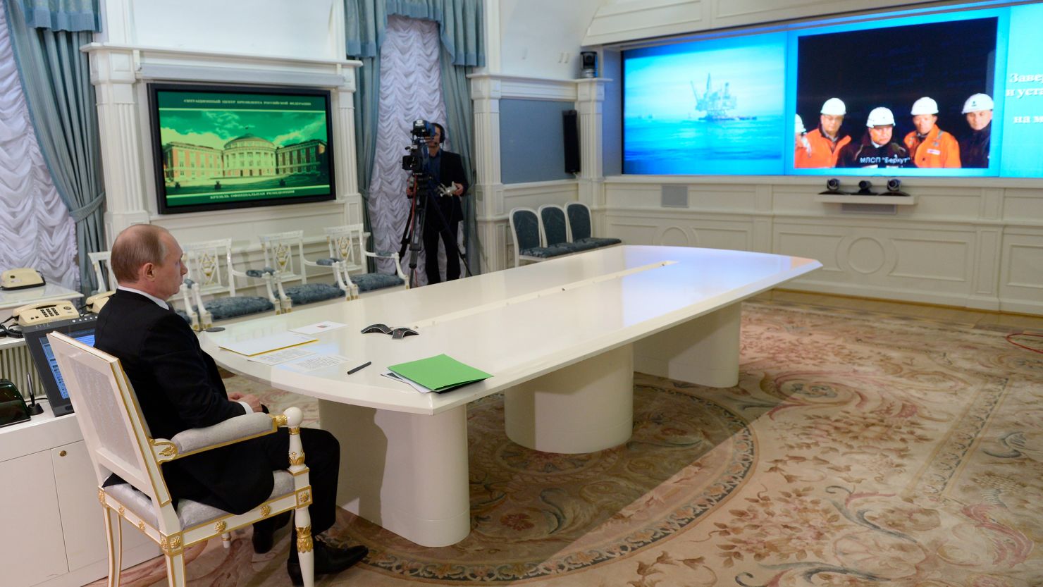 Russian President Vladimir Putin has a video conference with the Berkut offshore drilling platform launched in the Sea of Okhotsk as part of the Sakhalin-1 oil and gas project, in Moscow, Russia, Friday, June 27, 2014.