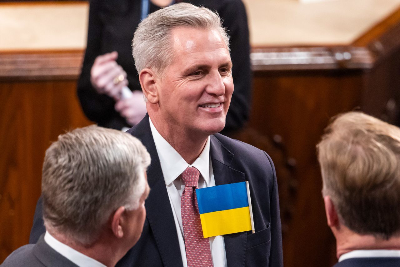 House Minority Leader Kevin McCarthy wears a Ukrainian flag inside the chamber.
