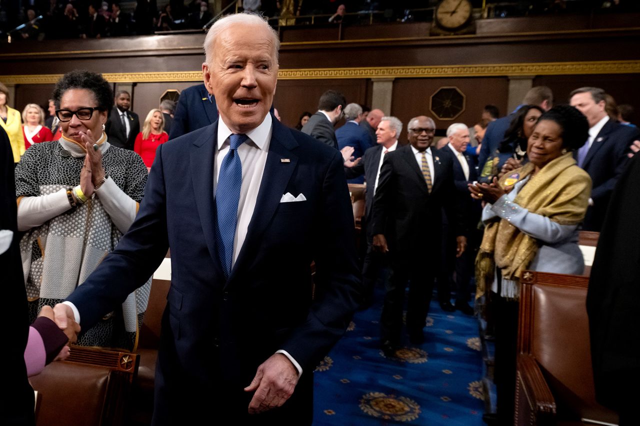 Biden arrives in the House chamber to deliver his speech.