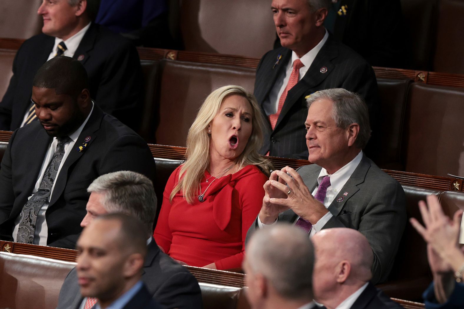 Rep. Marjorie Taylor Greene, a Republican from Georgia, reacts during Biden's speech.