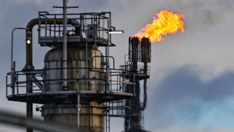 Surplus gas is burned off at a crude oil processing plant in Germany.