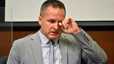 Former Louisville Police officer Brett Hankison wipes a tear as he testifies in court on Wednesday about the botched raid of Breonna Taylor's home.