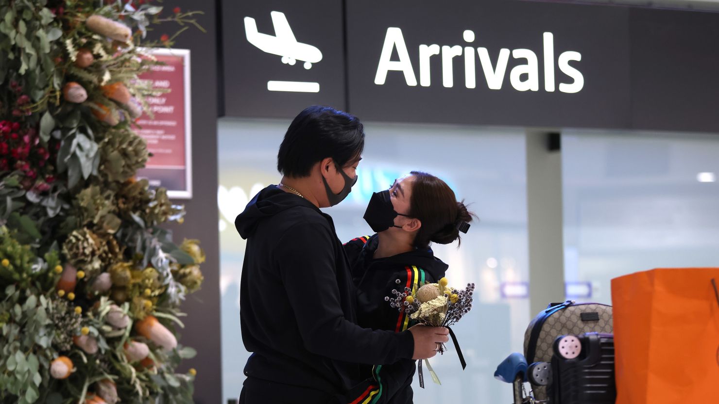 Returning international passengers are greeted on arrival at the Perth International Airport Terminal on March 3, 2022 in Perth, Australia.