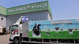 An Israeli flag is set atop a delivery truck outside US ice-cream maker Ben & Jerry's factory in Be'er Tuvia, on July 21, 2021. Ben & Jerry's announced that it will stop selling ice cream in the Israel-occupied Palestinian territories since it was "inconsistent with our values", although it said it planned to keep selling its products in Israel. 