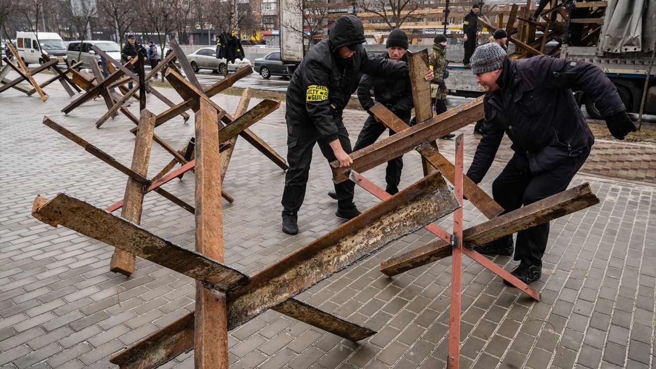 Ukrainian militia members set up anti-tank barricades in Kyiv on March 2.