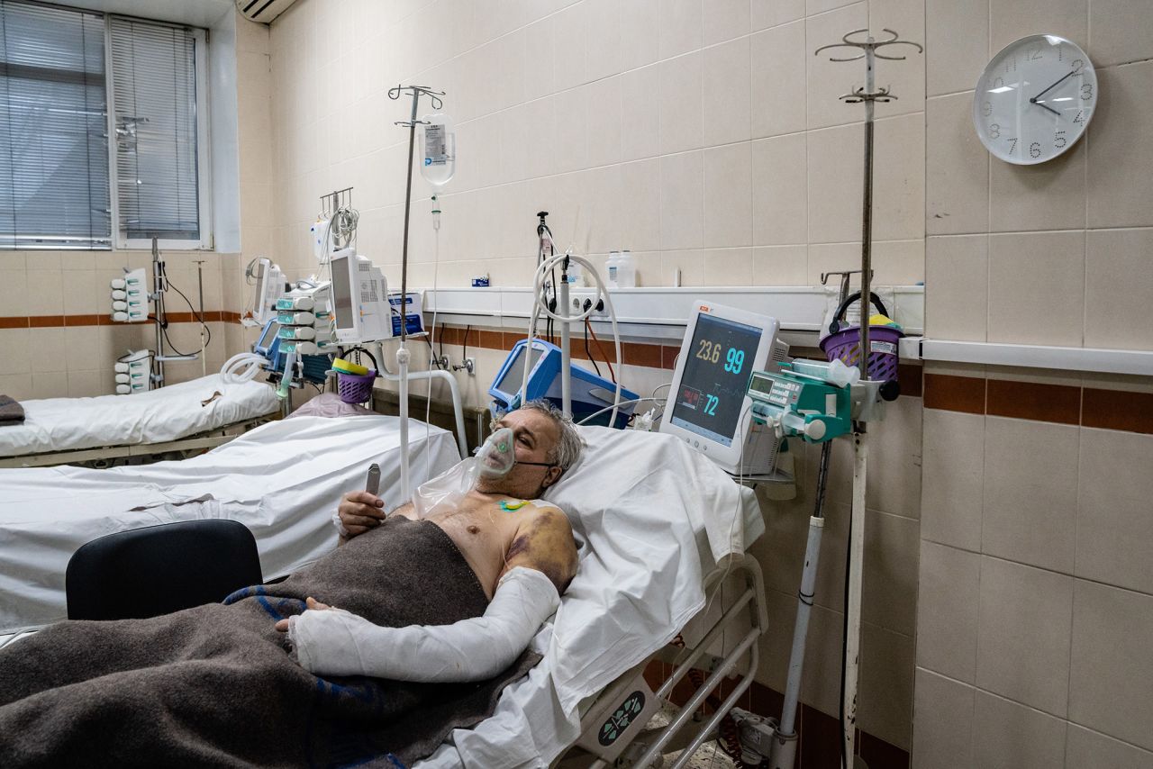 Leos Leonid recovers at a hospital in Kyiv on March 3. The 64-year-old survived being crushed when an armored vehicle drove over his car. <a href="https://www.cnn.com/videos/world/2022/02/27/bystanders-military-vehicle-ukraine-sot-vpx.cnn" target="_blank">Video o