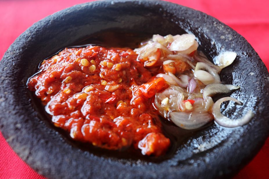 <strong>Sambal belachan (shrimp paste chili):</strong> Sambal belachan is the ultimate spice bomb. It goes well with everything, even plain rice.