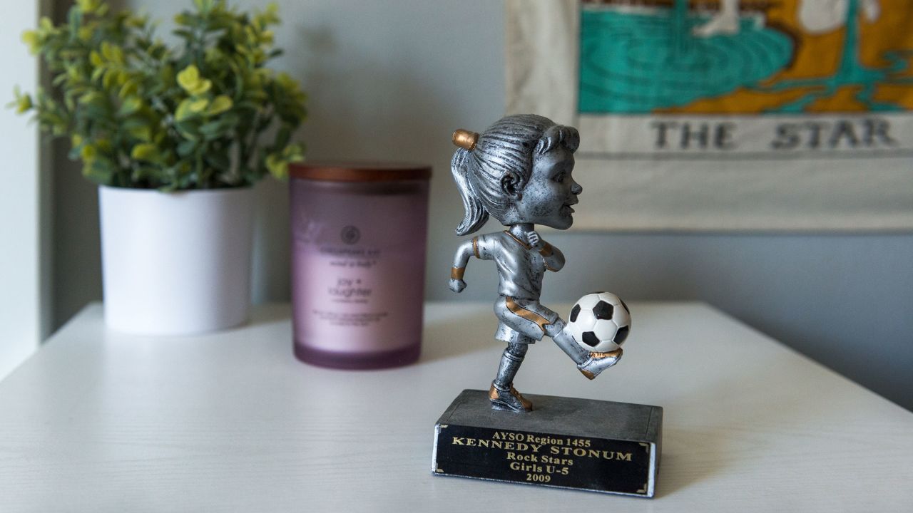 A soccer trophy sits on Kennedy Stonum's nightstand. "That had been her big thing most of her life, playing soccer year-round," her father says.