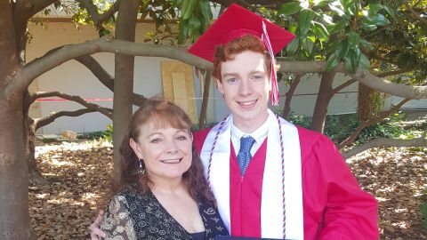 Tyler Gilreath and his mother, Tamra Demello, after his high school graduation in
May 2019. He died in September at age 20.