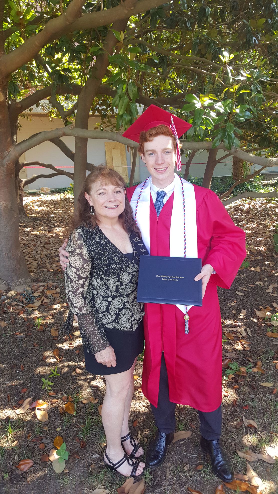 Tyler Gilreath and his mother, Tamra Demello, after his high school graduation in
May 2019. He died in September at age 20.