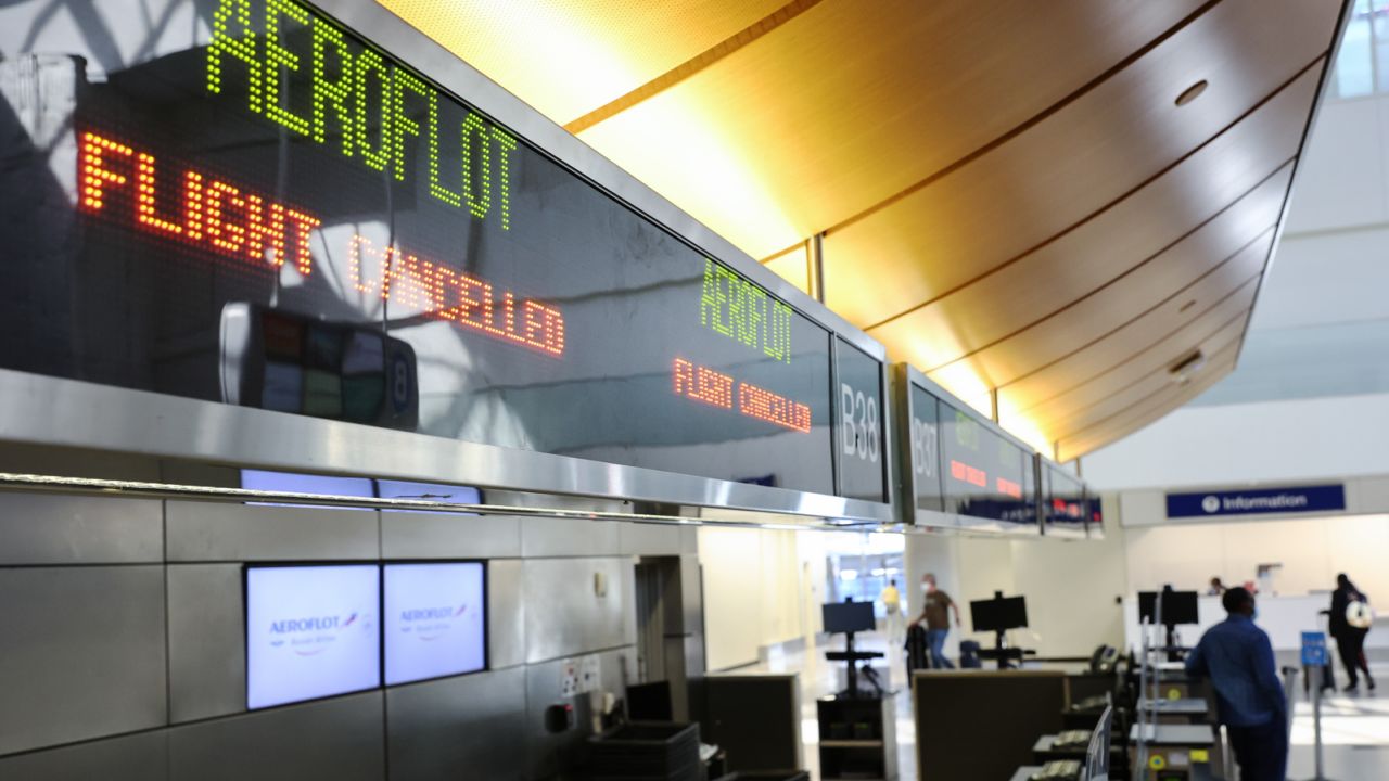 LOS ANGELES, CALIFORNIA - MARCH 02: A sign reads 'Flight Cancelled' at the Aeroflot check-in counter in the Tom Bradley International Terminal at Los Angeles International Airport (LAX) on March 02, 2022 in Los Angeles, California. President Joe Biden announced a ban on Russian aircraft in U.S. airspace during his State of the Union address yesterday. (Photo by Mario Tama/Getty Images)
