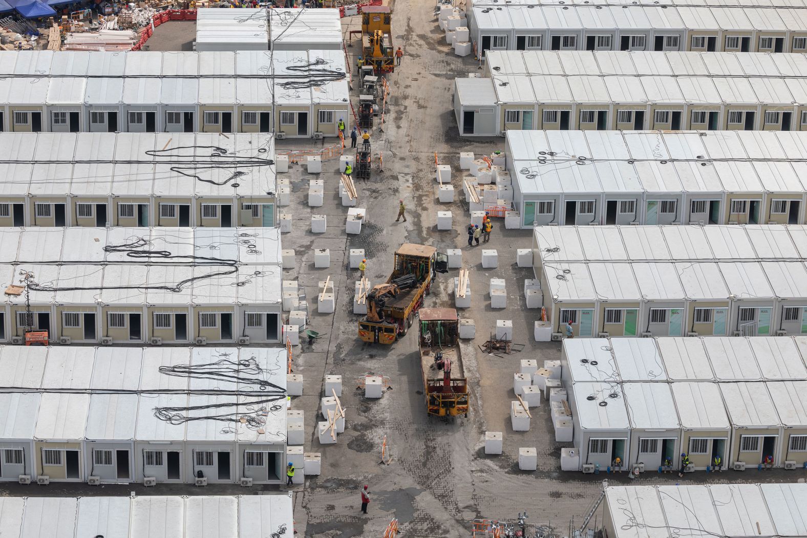 Construction work takes place on the site of a makeshift hospital in Hong Kong on Monday, February 28. The health care system in Hong Kong has been overwhelmed by <a href="index.php?page=&url=https%3A%2F%2Fwww.cnn.com%2F2022%2F02%2F16%2Fchina%2Fhong-kong-covid-singapore-mic-intl-hnk%2Findex.html" target="_blank">the city's biggest outbreak yet of Covid-19.</a>