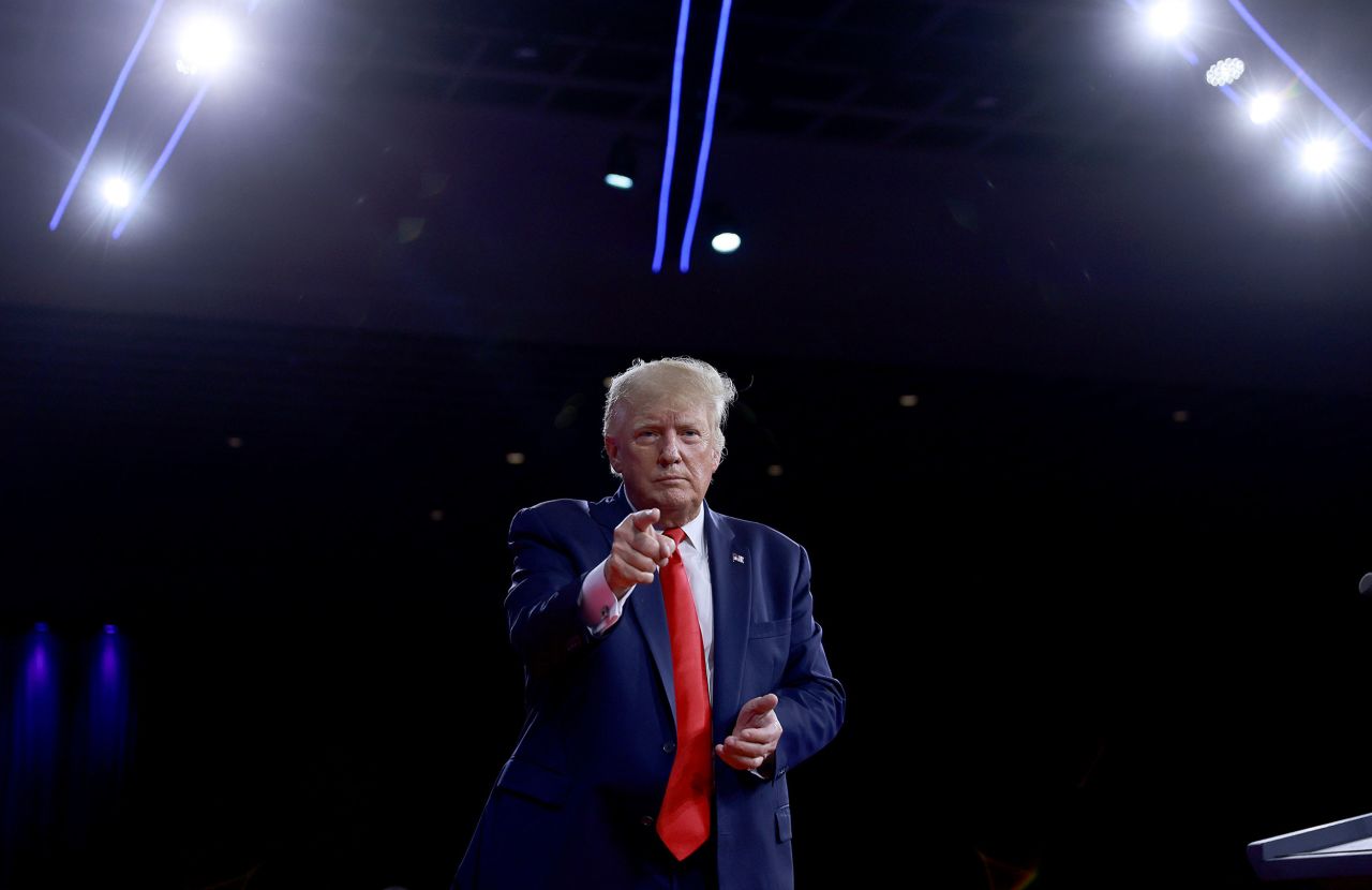 Trump points while speaking at the Conservative Political Action Conference in February 2022.