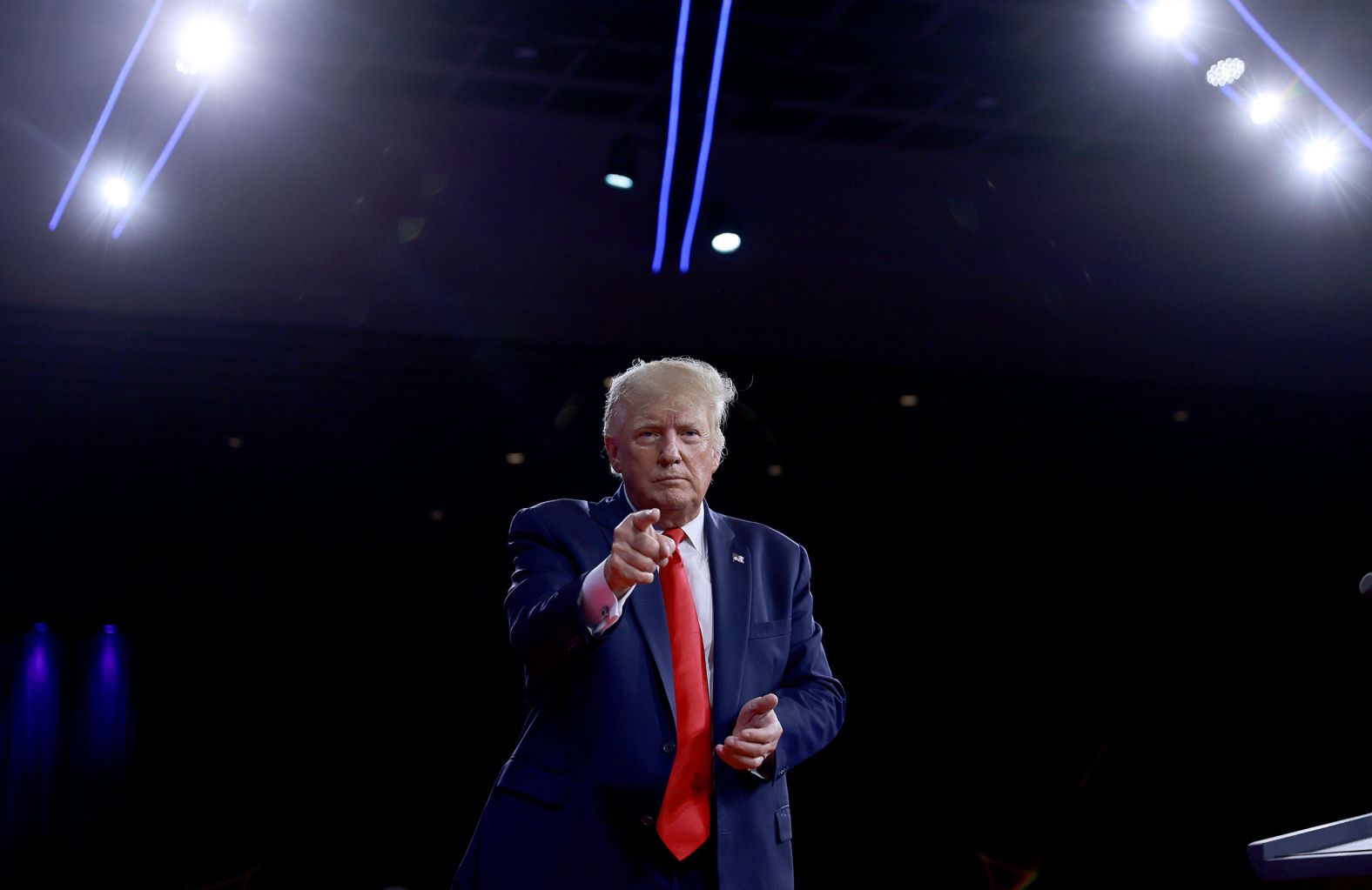 Former US President Donald Trump points while speaking at the Conservative Political Action Conference in Orlando on Saturday, February 26.