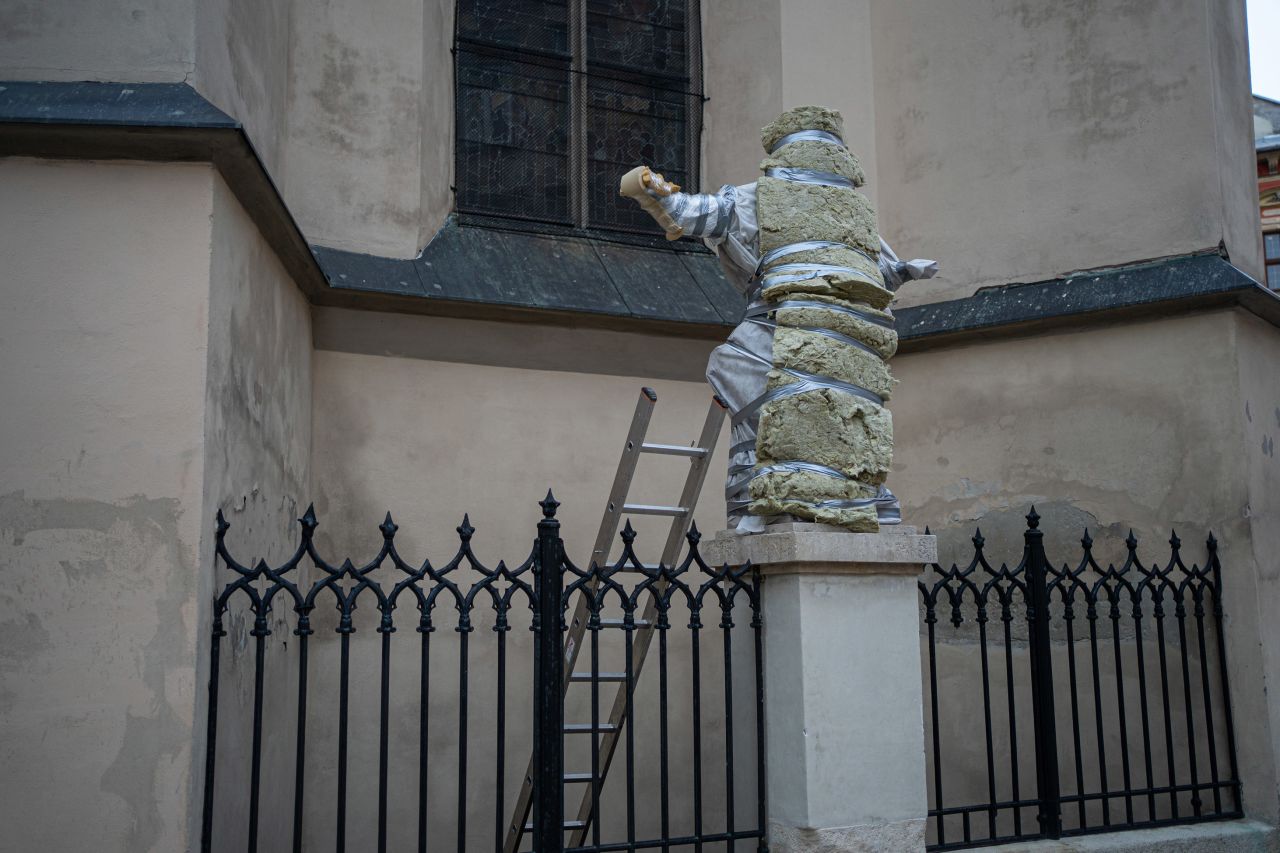 A statue outside Lviv's 14th-century Latin Cathedral.