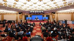 Journalists attend a press conference of the fifth session of the 13th National Committee of the Chinese People's Political Consultative Conference, or CPPCC, in Beijing, China, on March 3, 2022. Guo Weimin, a spokesperson for the 13th National Committee of the CPPCC, briefed media on the session and took questions on China's COVID prevention and control measures.