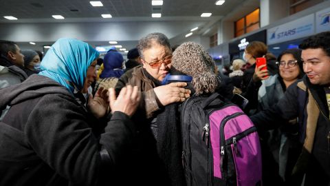 Tunisians who fled to Romania following Russia's invasion of Ukraine were photographed on March 2 hugging their relatives in tears as they arrived at the airport in the Tunisian capital of Tunis.