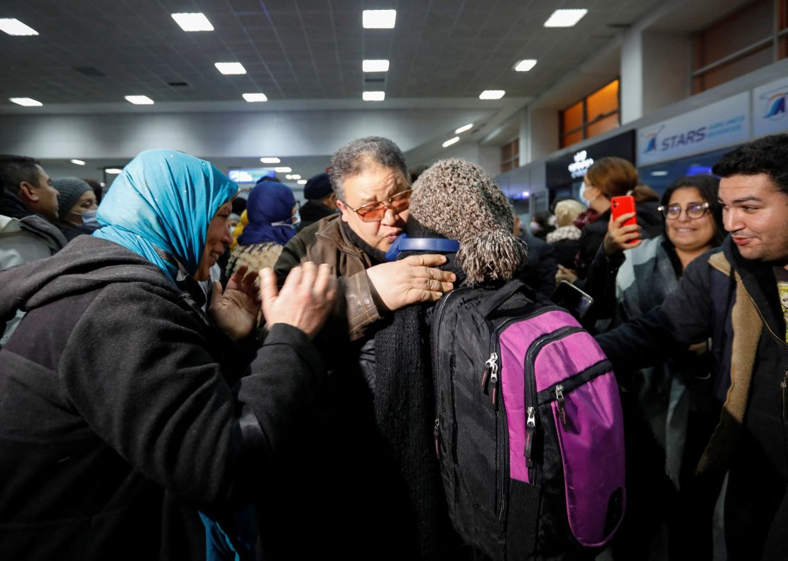 Tunisians who fled to Romania following Russia's invasion of Ukraine were photographed on March 2 hugging their relatives in tears as they arrived at the airport in the Tunisian capital of Tunis. 