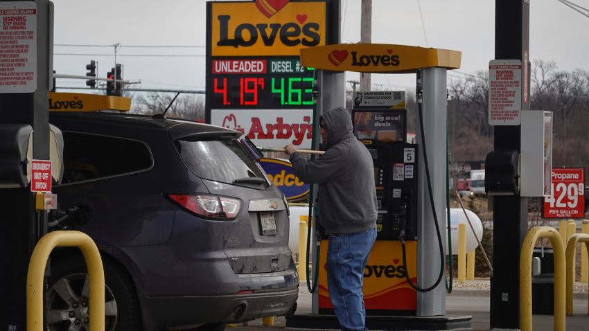 Gas prices are displayed on a sign at a gas station on March 03, 2022 in Hampshire, Illinois.