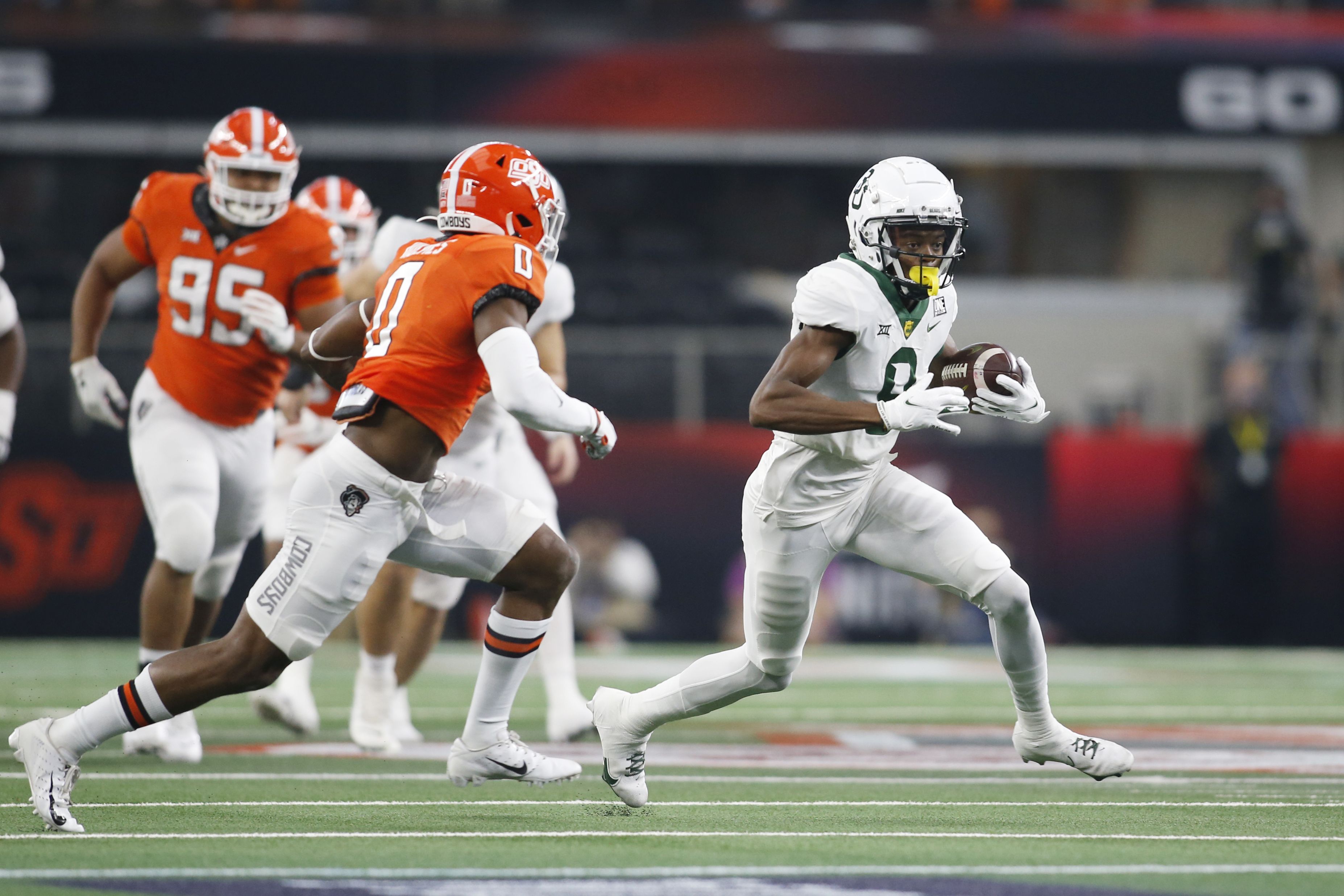 Ohio State WR Chris Olave runs mad dash at NFL Combine