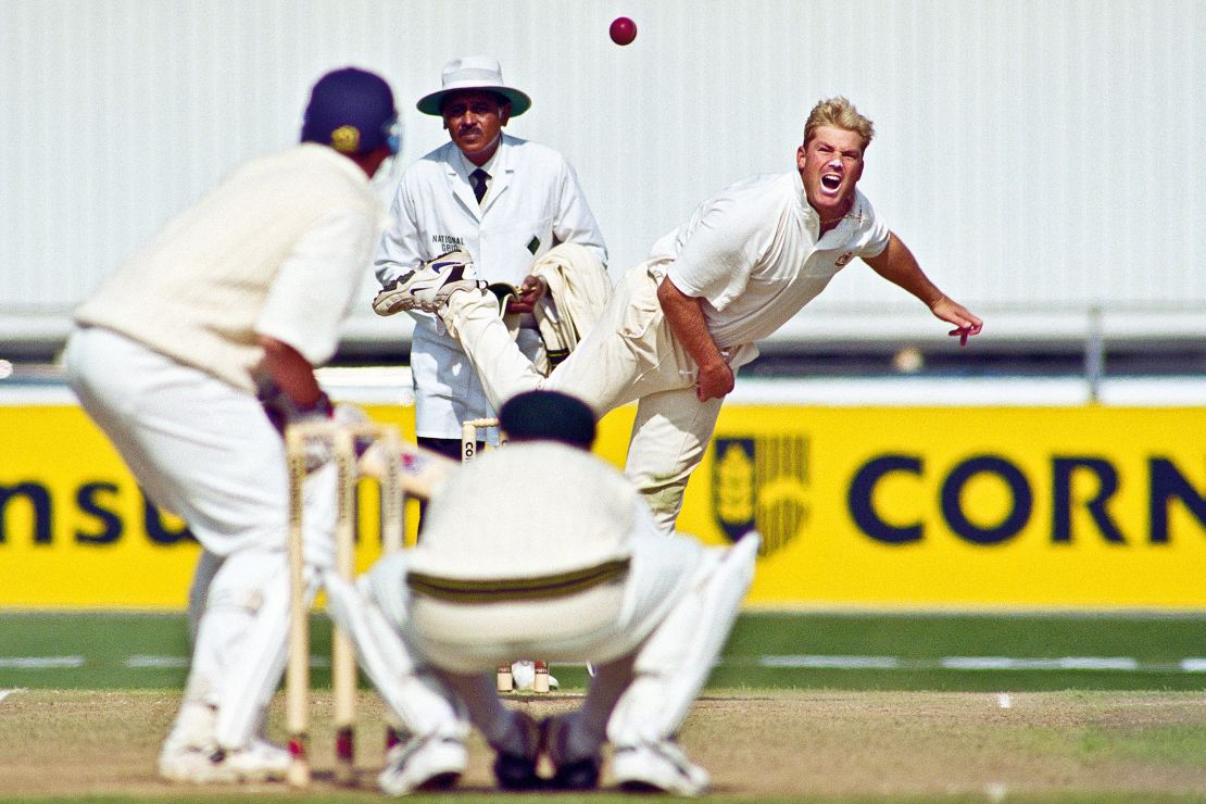 Warne bowling during the Third Ashes test match against England at Old Trafford cricket ground on July 4, 1997.