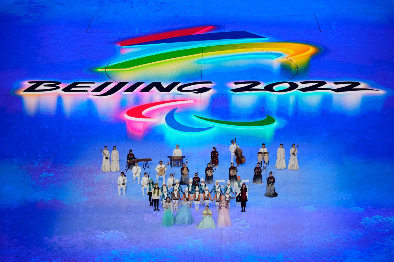 Musicians perform inside the stadium during the opening ceremony.