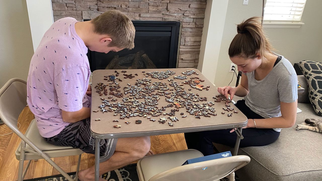Stutzman says she loved watching Palmer and Anabelle's relationship grow during the pandemic. She snapped this photo of the couple working on a puzzle together.